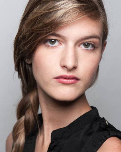 Close headshot of a young aspiring model